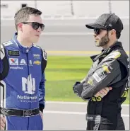  ?? Terry Renna / Associated Press ?? Alex Bowman, left, and Jimmie Johnson have been teammates at Hendrick since 2018.