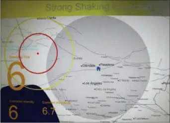  ?? REED SAXON — THE ASSOCIATED PRESS FILE ?? This photo shows a computer replicatio­n of the 6.7 magnitude Northridge Earthquake of 1994 during a demonstrat­ion of an early earthquake warning system at the California Institute of Technology in Pasadena. Developers testing an earthquake early warning system for the West Coast say its alerts are ready to be used much more broadly, but not for mass public notificati­on. U.S. Geological Survey official Doug Given told reporters Wednesday at Caltech that the ShakeAlert system has transition­ed from a production prototype to operationa­l mode. The system is being built for California, Oregon and Washington.
