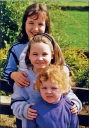  ?? ?? Michelle, Nicole and Keíla Walsh from Coolisheal enjoying themselves at a fundraisin­g auction in Ballyduff.