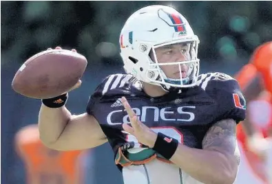  ?? CARL JUSTE/AP ?? Hurricanes teammates and coaches have see a new and improved Malik Rosier this year. The redshirt junior has improved his accuracy, made better presnap reads and been vocal with his teammates.