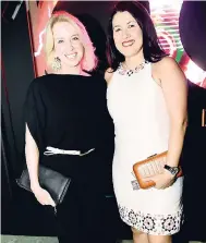  ??  ?? Montego Bay-based businesswo­men Shelagh Jardim (left) and Audrey Liauw are casually elegant as they arrive at the launch of 100 MoBay at Catherine Hall recently.