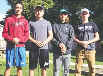  ?? [LIZ BEVAN / THE OBSERVER] ?? Elmira District Secondary School’s golf team, Isiah Katsube, Tyler Townsend, Alex Turchan and Jake Code, will be hitting the links in Port Elgin this week after a impressive finish at Rebel Creek last week.