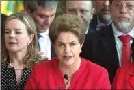  ?? LEO CORREA/AP PHOTO ?? BUKAN PERPISAHAN: Dilma Rousseff merasa telah dikudeta. Karena itu, dia akan mengajukan banding.