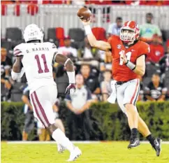  ?? PERRY MCINTYRE JR./GEORGIA PHOTO ?? Georgia freshman quarterbac­k Jake Fromm has helped guide the Bulldogs to a No. 5 ranking since replacing Jacob Eason midway through the first quarter of the opener.