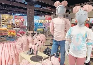  ??  ?? Disney follows popular trends — such as the mania for colors such as rose gold and millennial pink — and adapts them into their product lines, including ear gear.