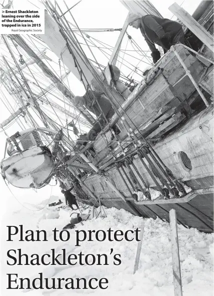  ?? Royal Geographic Society Photos: Falklands Maritime Heritage Trust/National Georgraphi­c ?? > Ernest Shackleton leaning over the side of the Endurance, trapped in ice in 2015