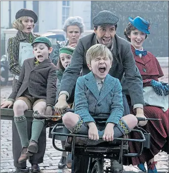  ??  ?? NANNY STATE: Life’s much more fun when Mary Poppins (Emily Blunt, right) takes charge