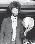  ?? AP ?? Artis Gilmore, a 7- foot- 2 player from Jacksonvil­le University, was signed by the Kentucky Colonels as their first- round pick of the 1971 draft.