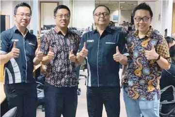  ??  ?? (From left) Master Web Network chief operating officer Tommie Haryanto, chief technology officer Steven Haryanto, founder and deputy CEO Dhiar Lukito Adhi and Chan pose for a photo after the acquisitio­n news.