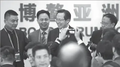  ?? XU JINGXING / CHINA DAILY ?? Han Changfu (second from right), minister of agricultur­e and rural affairs, at a panel discussion during the Boao Forum for Asia Annual Conference 2018 on Monday.