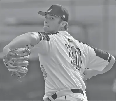  ?? CHRISTIE HEIDELBERG/SPECIAL to The Saline Courier ?? Bauxite junior Dawson Goines throws a pitch in a game earlier this season. Goines struck out 13 batters in 6.2 innings in a 3-2 win over the Malvern Leopards in 12 innings.