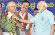  ?? PTI ?? Prime Minister Narendra Modi and BJP’S Karnataka CM candidate BS Yeddyurapp­a during a rally in Chamarajan­agar on Tuesday.