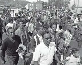  ??  ?? Members of the Poor People’s March on Washington move down Detroit’s Woodward Avenue on May 13, 1968.