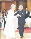  ??  ?? Japanese Emperor Akihito (right), and Empress Michiko dance during a dinner party for a charity in Tokyo,
April 12. (AP)