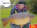  ??  ?? LEE Tompkins’ storm-swept visit to Grenville Lake, Cambs, was capped by a 39lb 8oz mirror which took a Bait-Tech Krill & Tuna pop-up, pre-soaked in matching oil.