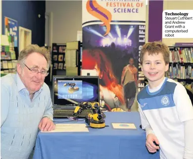  ??  ?? Technology Steuart Cuthbert and Andrew Grant with a computeris­ed robot