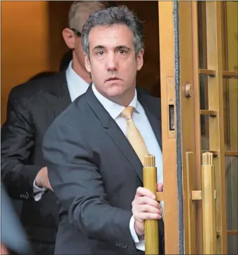  ?? MARY ALTAFFER/AP PHOTO ?? Michael Cohen leaves federal court in New York on Tuesday after pleading guilty to charges including campaign finance fraud stemming from hush money payments to a porn actress and an ex-Playboy model.