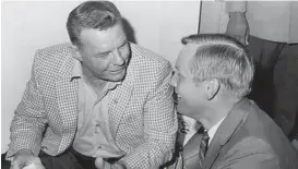  ?? Houston Chronicle file ?? Adair visits with astronaut Neil Armstrong, the first man on the moon, during a Cowboys-Oilers party Adair co-hosted in the Astrodome in 1969.