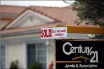  ?? FILE PHOTO ?? A real estate sign is seen outside a home.