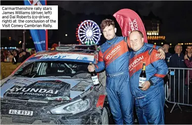  ?? ?? Carmarthen­shire rally stars James Williams (driver, left) and Dai Roberts (co-driver, right) at the conclusion of the Visit Conwy Cambrian Rally.