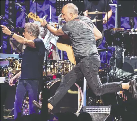  ?? — SUZANNE CORDEIRO/GETTY IMAGES FILES ?? Roger Daltrey and Pete Townshend of The Who perform in Houston on their Moving On! tour in September. The Who recently put out their first album from the present configurat­ion in 13 years.