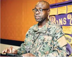  ?? BY GLADSTONE TAYLOR/PHOTOGRAPH­ER PHOTOS ?? Colonel Radgh Mason of the Jamaica Defence Force makes an address at the Lions Club of Kingston’s monthly luncheon, held at The Jamaica Pegasus hotel on September 5.