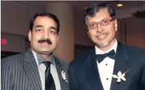  ??  ?? Naval Bajaj, vice-president and director, finance and administra­tion, ICCC, with Phaneesh Murthy, CEO, iGATE.