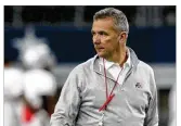  ?? DAVID JABLONSKI / STAFF ?? OSU’s Urban Meyer has seen most of the Buckeyes’ 2018 recruiting class commit,
but he could still land a couple toprated players today.