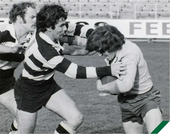  ?? ?? Otago wing Kenny Mitchell doing his best for Green Island against Southern in 1978 to win the club’s last premier championsh­ip. Photo: Otago Daily Times