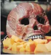  ??  ?? Prosciutto is one of Lombardi’s go-to ingredient­s to make things like this skull delicious and gory.