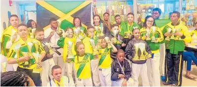  ?? CONTRIBUTE­D PHOTOS ?? The Jamaican contingent that represente­d in the Homestead Internatio­nal Tournament earlier this year