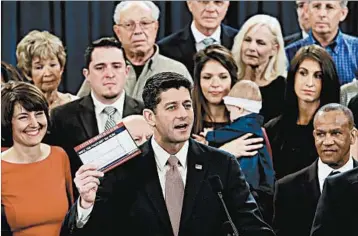  ?? WIN MCNAMEE/GETTY ?? House Speaker Paul Ryan, seen introducin­g tax legislatio­n, says the plan would save the average U.S. family $1,182 a year.