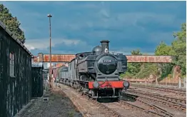  ?? ?? GWR 0-6-0PT No. 7714 shunts freight stock at Kiddermins­ter, with the footbridge in the background. JOHN TITLOW