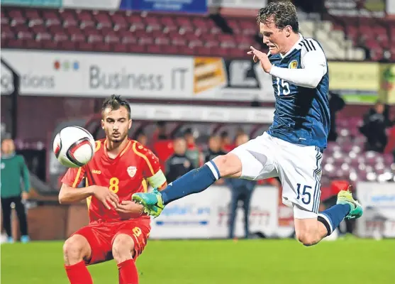  ?? SNS. ?? takes to the air in the European Under-21 Championsh­ip qualifier at Tynecastle but the hosts were left grounded after losing 1-0 to Macedonia.