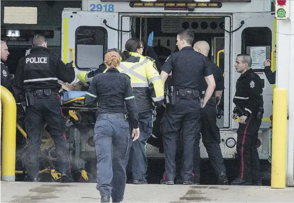  ?? SHAUGHN BUTTS ?? A man who was shot by police was reported to be in critical condition as he arrived at the Royal Alexandra Hospital on Monday.