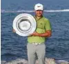  ?? – Supplied photo ?? ULTIMATE DESTINATIO­N: A file photo dated November 5, 2016 shows Jordan Smith of England posing with the Road to Oman Rankings Trophy at Almouj Golf.