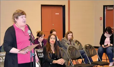  ?? JAMES MILLER/The Daily Courier ?? Teachers union president Susan Bauhart makes a passionate address to trustees at Wednesday’s Central Okanagan School Board meeting where trustees voted 5-2 in favour of a grade configurat­ion in West Kelowna.