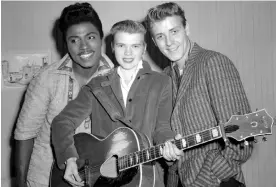  ?? Photograph: Fairfax Media ?? Unexpected­ly thrust back in the spotlight … Little Richard, Alis Lesley and Eddie Cochran, arrive in Sydney, 1957, in a picture that has been used as the cover for Bob Dylan’s new book.