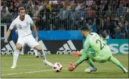  ?? ALASTAIR GRANT — ASSOCIATED PRESS ?? England’s Harry Kane plays the ball against the goal post against Croatia on July 11 in Moscow.