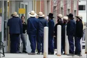  ?? GENE J. PUSKAR - THE ASSOCIATED PRESS ?? A group of Amish gather outside the Crawford County Judicial Center in Meadville, Pa., following a preliminar­y hearing Friday, March 15, for Shawn C. Cranston, 52, of Corry, Pa., who is accused of killing Rebekah Byler and her unborn child inside the Byler home near Spartansbu­rg, Pa., on Feb. 26.