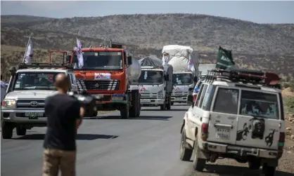  ??  ?? A convoy of MSF trucks carrying medical supplies in Tigray, northern Ethiopia, in May. Photograph: Ben Curtis/AP