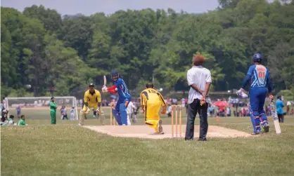  ?? ?? Cricketers play in the Bronx in New York City. The game is popular in immigrant communitie­s in the US. Photograph: Richard Levine/ Alamy