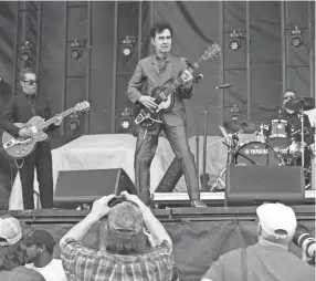  ??  ?? Tav Falco and the Panther Burns perform at Beale Street Music Festival on May 5, 2018, in Tom Lee Park in Downtown Memphis. YALONDA M. JAMES/THE COMMERCIAL APPEAL