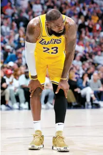  ?? AFP-Yonhap ?? LeBron James of the Los Angeles Lakers reacts during Game 5 of the NBA playoff first round series against the Denver Nuggets at Ball Arena in Denver, Monday.