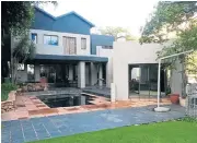  ??  ?? Sought-after area: This five-bedroom double-storey home in Northcliff goes under the hammer on October 17.