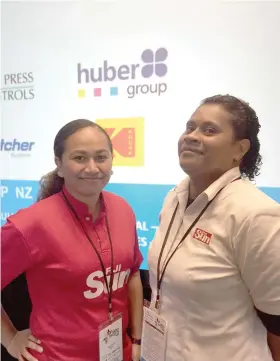  ??  ?? Prepress Supervisor Rayape Karavaki-Qumivutia and Press Lead Colour Hand Joana Bueta at New Zealand’s top conference for newspaper production managers and printers, known as SWUG.