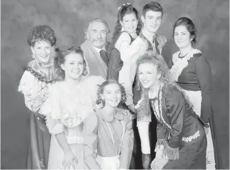  ?? DAVID LOWES PHOTO ?? The cast of Victoria Operatic Society’s production of Meet Me in St. Louis. The stage version, based on a beloved 1944 movie musical, doesn’t offer much in the way of plot. It’s all about the tunes.