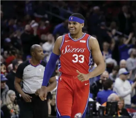  ?? MATT SLOCUM — ASSOCIATED PRESS ?? Tobias Harris and his fellow Sixers, new and old, had plenty to smile about Friday during the team’s 117-110 win over Denver.