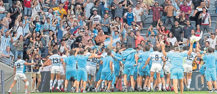  ??  ?? TEARS OF JOY: In the biggest story in the rugby world last week, Argentina players celebrate a famous victory over the All Blacks in front of their adoring supporters.