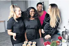  ??  ?? Brighter futures: graduates of the Luminary Bakery, from left, Sarah, Halimot, Monica and Matilda. Below, the Duchess joins Sarah to decorate a three-tiered cake